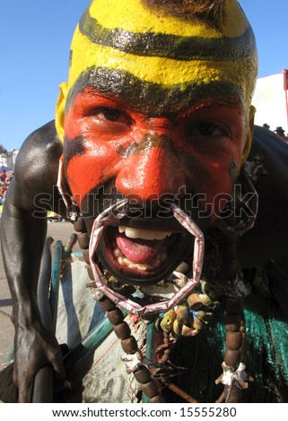 BARRANQUILLA, COLOMBIA- FEBRUARY 02: Closeup of a black man in a traditional masquerade on a carnival in the city of Barranquilla. Barranquilla\'s Carnaval February 02, 2008 in Colombia.
