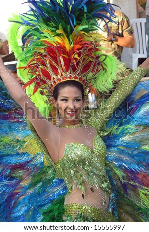 BARRANQUILLA, COLOMBIA- FEBRUARY 02: Sexy young woman in a traditional clothes dancing on a carnival in the city of Barranquilla. Barranquilla's Carnaval February 02, 2008 in Colombia.