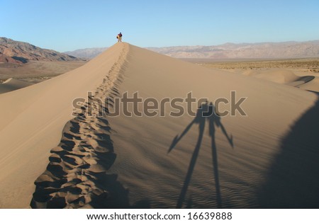 Trekking in sand dunes. Funny shadows in sand. Stovepipe Wells. Death Valley national park. California. USA