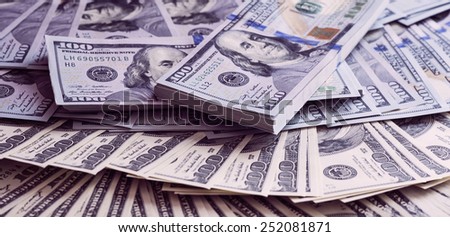 Background with new and old face value of 100 dollars