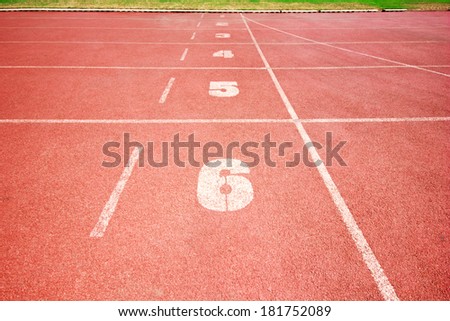 Running track number in front of tracks in stadium