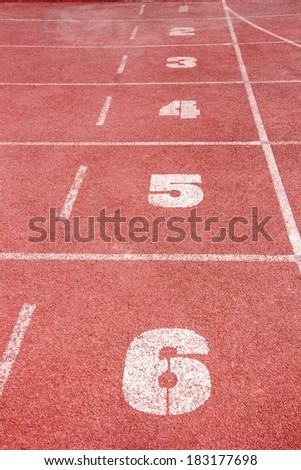 Running track number in front of tracks in stadium