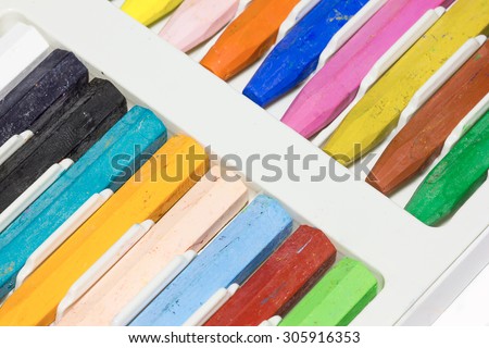 Color Crayons In A Box on white background.
