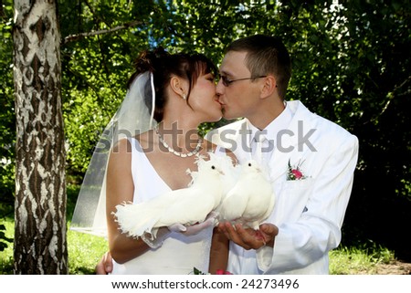 Photo of the groom and bride kissing each other