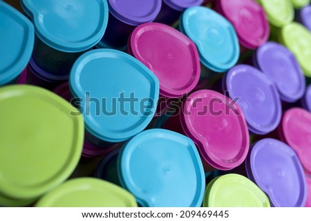 A collection of heart-shaped food containers of various colors