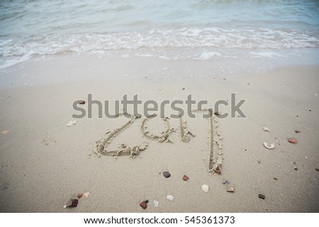 Happy New Year 2017, lettering on the beach.