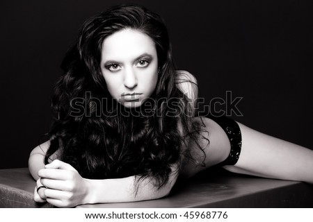 stock photo : sexy pin-up model in black and white lying down