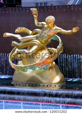 NEW YORK CITY - JANUARY 18: The golden Prometheus statue at the Rockefeller center on January 18, 2010 in New York, NY. This bronze gilded statue  is located at the front of 30 Rockefeller Plaza