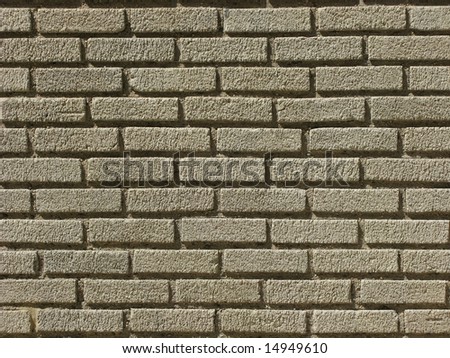 Sandy colored brick wall