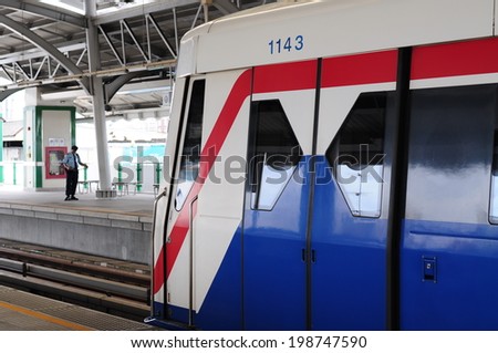 BANGKOK - JUNE 15: BTS Skytrain at a station as the rail network of operations in the Thai capital JUNE 15, 2014 in Bangkok, Thailand.