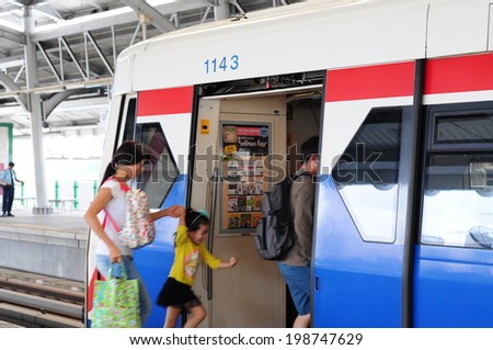 BANGKOK - JUNE 15: BTS Skytrain at a station as the rail network of operations in the Thai capital JUNE 15, 2014 in Bangkok, Thailand.