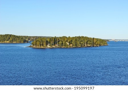 Colorful landscape of Baltic sea with island near coastline of Sweden