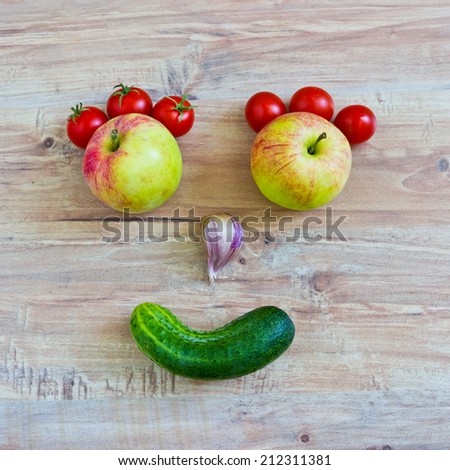 Funny smiling face. Conceptual image with vegetables