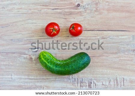 Funny smiling face. Conceptual image with vegetables. Face at the central part of image