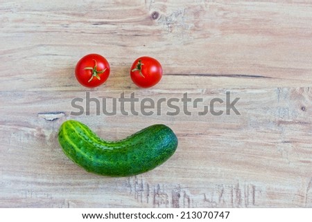 Funny smiling face. Conceptual image with vegetables. Face at the left part of image