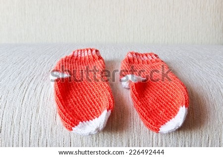 Colorful wool baby socks isolated on white background. Socks at the central part of image