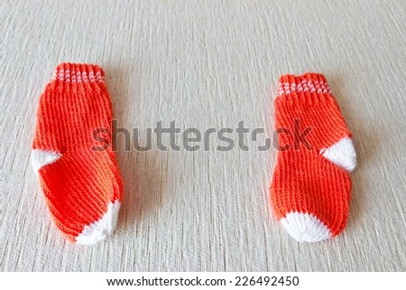 Colorful wool baby socks isolated on white background
