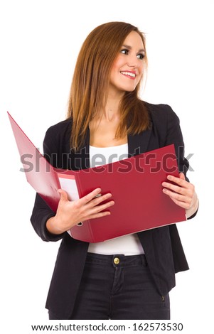 Female Student with ring binder. Business woman holding red ring binder and looking away. Three quarter length studio shot isolated on white.