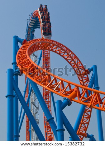 roller coaster in amusement park with vertical drop
