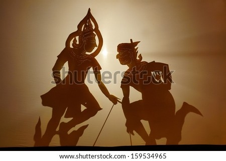 Ubon Ratchathani, Thailand - July 29, 2012: Thai traditional shadow puppet movie called  Nung Ta-Lung was displayed in the candle festival.