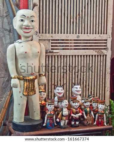 Hanoi, Vietnam - May 2, 2012: Wooden puppets are souvenirs for sale to the tourists who watch the puppet show at the theater.