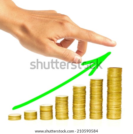 hand pointing at a green arrow over piles of golden coins arranged as a graph / business growth