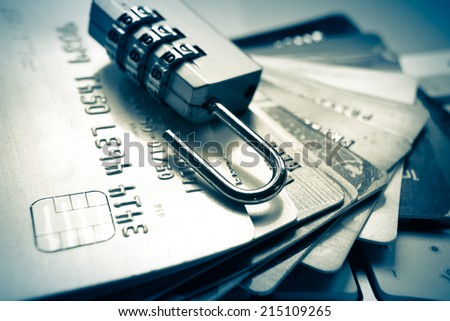 open security lock on credit cards with computer keyboard