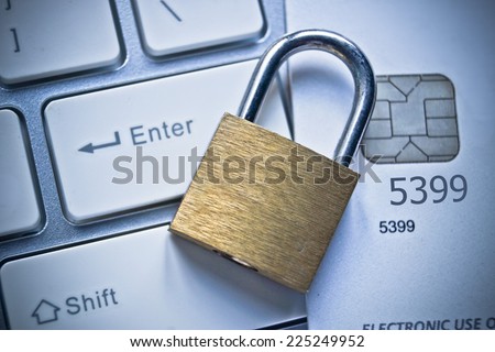 security lock on credit cards with computer keyboard - credit card data security