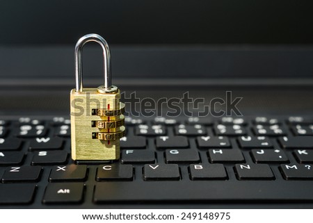 open security lock on black computer keyboard