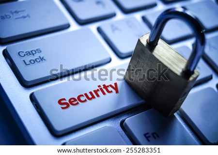 security lock on black computer keyboard - computer security concept