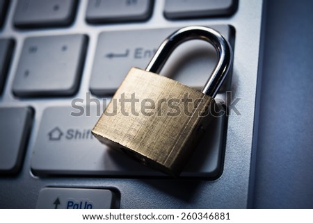 security lock on a computer keyboard - computer security concept