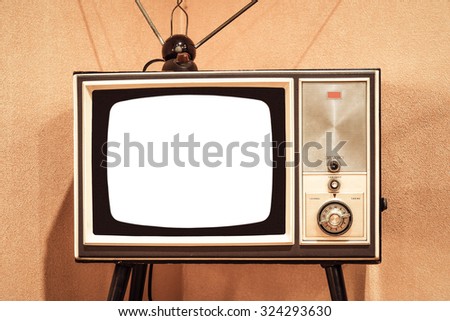 Front view of vintage TV with white blank screen to add text or image