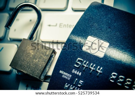 Unlocked security lock on credit cards / Credit cards data decryption and fraud concept