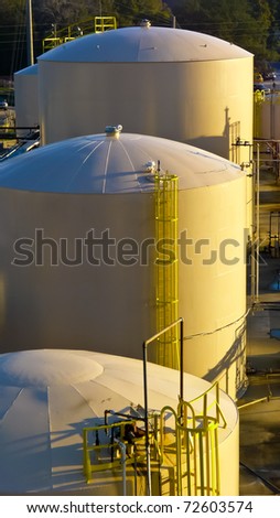 Chemical storage tanks in early morning sun