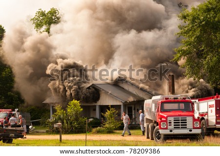 BONIFAY, FL - MAY 21: A home on Smith Chapel Road was totally destroyed by fire on Saturday, May 21, 2011 in north Holmes County in the town of Bonifay, Florida . No one was home at the time of the blaze.
