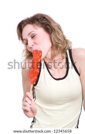 stock photo girl with red lollipop in yellow clothes is suck and thinking 