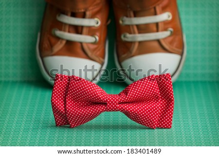 Bow tie and  sneakers