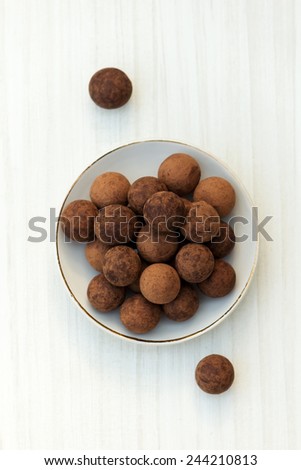Chocolate truffles. Chocolate truffles with cocoa powder