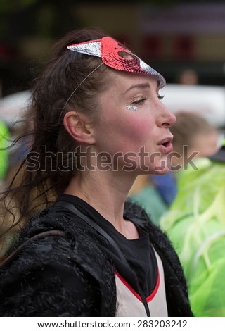 STOCKHOLM, SWEDEN - MAY 31, 2015. Unidentified woman attending the Peace and Love Parade. Street party in Stockholm.