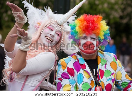 STOCKHOLM, SWEDEN - MAY 31, 2015. Peace and Love Parade. Street party in Stockholm, Clown and woman.