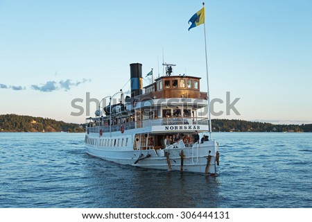 STOCKHOLM-AUG-13-2015. Passenger boat in the Stockholm archipelago. The boat carrying passengers between various islands in the Stockholm archipelago.