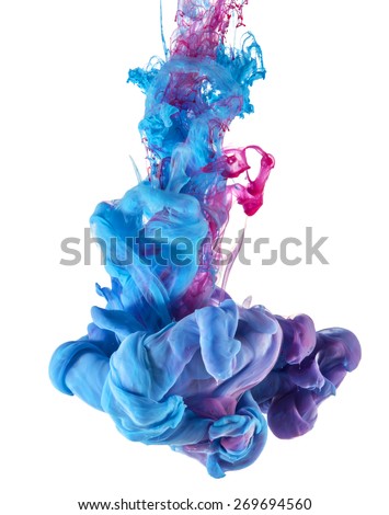 Color drop underwater creating a silk drapery. Ink swirling underwater.  Cloud of colorful shiny ink isolated on black background. Blue and magenta mix into violet.