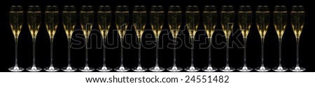 Very long banner with 17 champagne flutes in a row over black background with fireworks