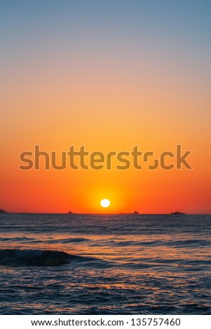 Beautiful sunrise over the horizon, vertical view