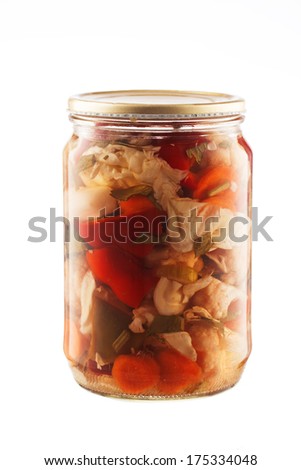 Mixed pickled vegetables in glass jar