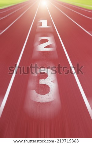 Motion blurred of running lane and number 1 to 3 in lane with light on destination