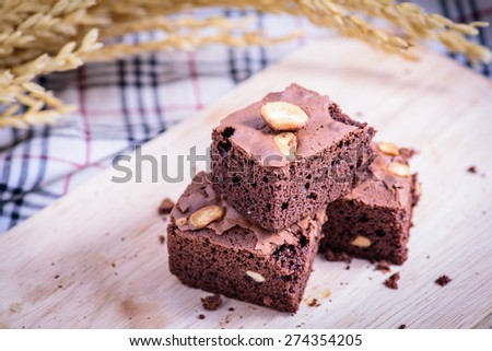 Chocolate brownie with nut and corn flower