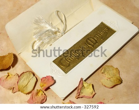 vintage marriage certificate with dried rose petals
