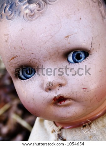 stock photo Cracked antique doll face