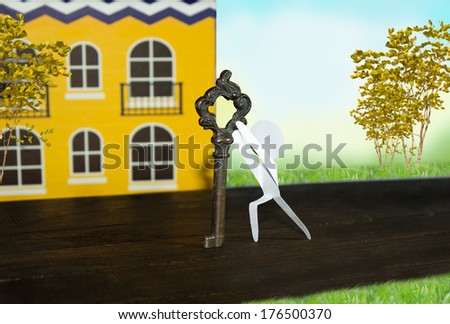 paper man drag key to his house